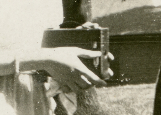 Detail of what is likely a Kodak No.3, Model B camera in use, circa 1920s