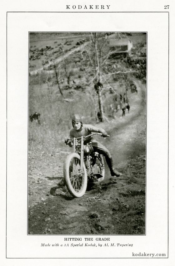Image taken from the January 1923 issue of Kodakery of a motorcycle rider coming down a hill