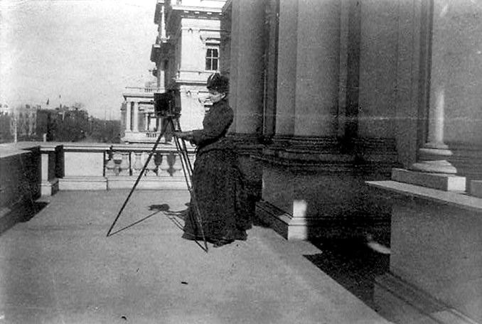 Pioneer female photographer Frances Johnston pictured with a large-format camera in Washington, D.C.